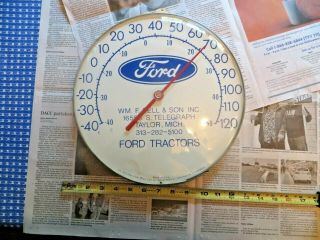 Vintage Round Metal Advertising Ford Tractors Thermometer,  Taylor Michigan,  No Re