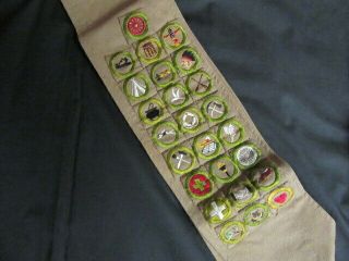 25 Full Square Merit Badges On Wide Tan Sash Npc1