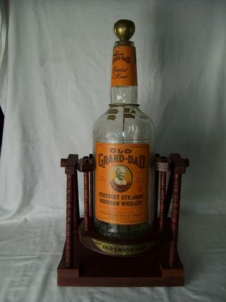 Vintage Old Grand - Dad Bourbon Whiskey Statesman Bottle Cradle Stand With Bottle