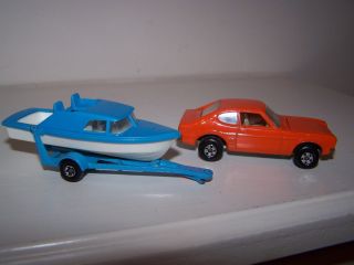 Matchbox Twin Pack Tp - 5 Weekender 54 Ford Capri Orange,  9 Boat With Trailer