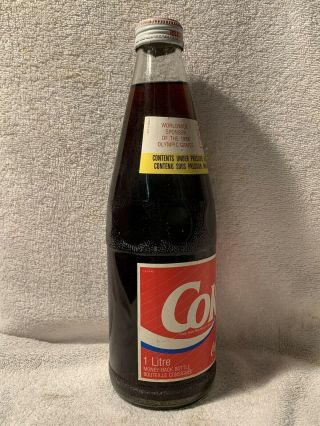 FULL 1 LITER COCA - COLA 1988 OLYMPIC GAMES PAPER LABEL SODA BOTTLE FROM CANADA 2