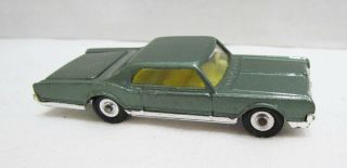 Husky Oldsmobile Starfire Coupe Die - Cast Toy Car Vintage Trunk Opens
