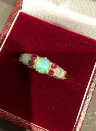 9ct Gold Ring Set With Opal And Ruby Size R.