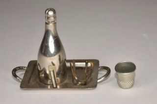 ANTIQUE WHITE METAL TRAY WITH BOTTLE AND THIMBLE FIGURAL TAPE MEASURE 3