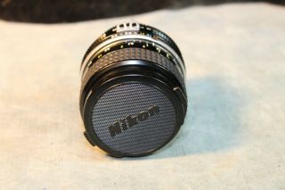 Vintage Nikon Nikkor Camera Lens 24mm 1:2.  8 529949 Nr