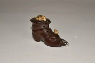 ANTIQUE CELLULOID BOOT WITH RATS FIGURAL TAPE MEASURE - 2 - 1/4”L,  1 - 1/2”H 3