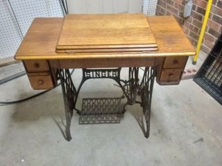 Antique1910 Singer Sewing Machine With Parts And Treadle Cabinet.
