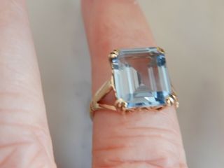 A Stunning 9 Ct Gold 5.  00 Carat Emerald Cut Blue Gemstone Ring