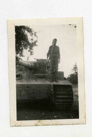 Photo Of A Captured Tiger Tank With Gi Standing On The Front