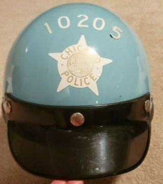 vintage Chicago police helmet and patches 2