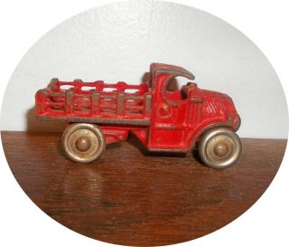 Cast Iron Red Mack Stake Truck Hubley Arcade - A C Williams