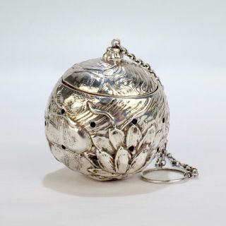 Antique American Art Nouveau Sterling Silver Tea Ball With Leafy Pad Design - Sl