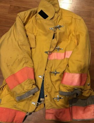 Firefighters Helmet And Fireproof Jacket
