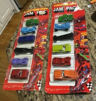 2 Vintage 1978 Tootsietoy Jam Pac Die Cast Camp Pack Toy Cars On Cards.  12 Cars.