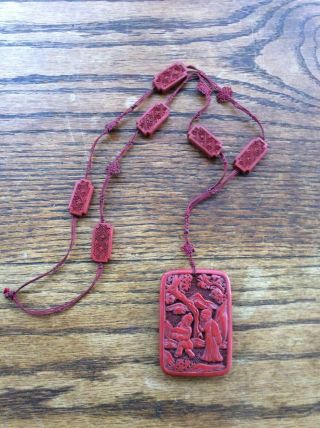 A Fine Chinese Antique Art Deco Carved Cinnabar Pendant Necklace