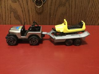 Vintage Tonka Silver Jeep Cj Wrangler With Matching Trailer And Snowmobile.
