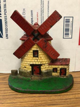 Cute Vintage Cast Iron Windmill Doorstop / Bookend - - Paint - - Yellow & Red