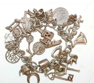 7.  5 " Loaded Vintage Sterling Silver Charm Bracelet,  23 Charms,  Opening 48g