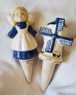 Two Vintage Ceramic Pottery Watering Can Plant Water Spike Dutch Windmill & Girl