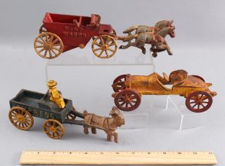 3 Antique Cast Iron Express Wagon,  Kenton Dump Wagon & Ac Williams Racecar Nr