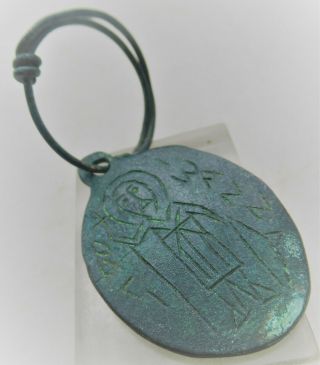 Ancient Byzantine Bronze Pendant With Saint Depiction And Twisted Loop