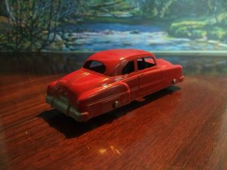 Tootsietoy 4 inch 1950 Pontiac coupe,  red. 2