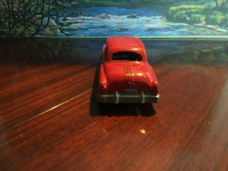 Tootsietoy 4 inch 1950 Pontiac coupe,  red. 3