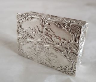 A sterling silver snuff box.  Depicting Angels.  Sheffield 1968.  By Francis Howard 2