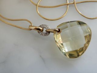 A Stunning 9 Ct Gold 12.  00 Carat Citrine And Diamond Pendant And Chain