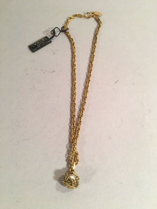 Vintage Chanel Gold Tone Necklace With Rhinestone Knot Charm Pendant
