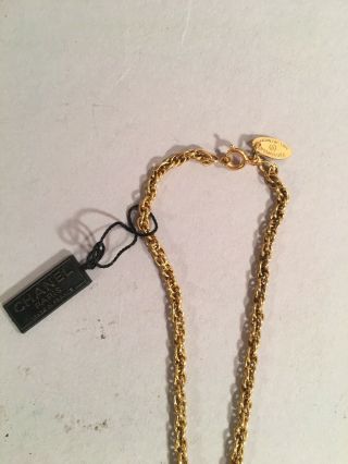 VIntage Chanel Gold Tone Necklace with Rhinestone Knot Charm Pendant 2