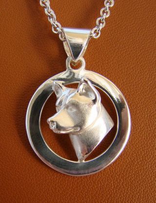Small Sterling Silver Akita Head Study On A Circle Frame Pendant