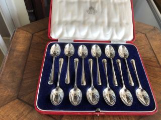 Cased Set Of 12 Solid Silver Coffee Spoons.  (london 1953) W W