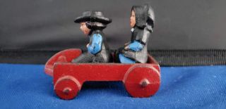 Vintage Cast Iron Amish Figure Boy And Girl On Garden Wagon