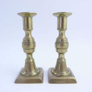 Small Brass Ejector Candlesticks,  19th Century