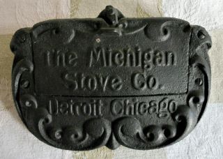 Antique The Michigan Stove Company Cast Iron Maker 