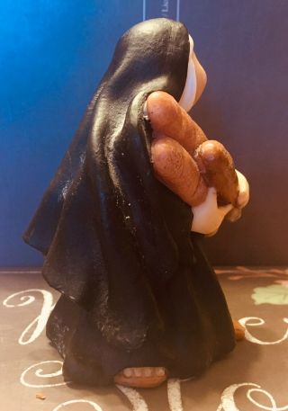Polymer Clay Figurine: A Nun Carrying Her Loaves Of French Bread. 3