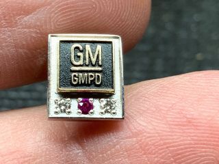 General Motors “gmpd” 10k Gold Double Diamond Ruby 25 Years Service Award Pin.