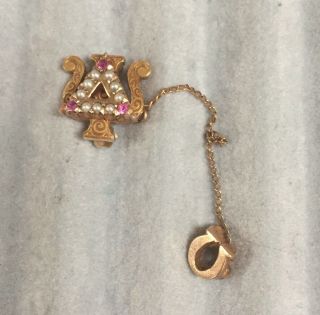Delta Psi Omega Fraternity Pin - Gold With Rubies And Pearls.