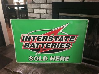 Vintage Interstate Batteries Embossed Metal Sign
