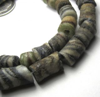 12 " Strand Of 33 Rare Well Worn Mixed Striped Ghana Sand Cast Glass Beads