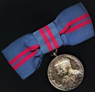 British Medal 1911 Coronation Medal King George V.  On Lady 