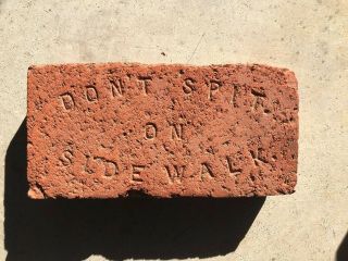 Rare.  Near.  Don’t Spit On Sidewalk Brick.  Bold Lettering