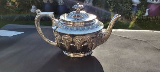 An Antique Victorian Silver Plated Tea Pot With Respoused Patterns By W&hs.