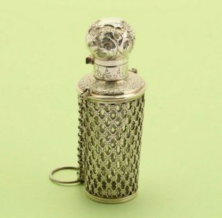 A Late 19th Century French Silver And Glass Scent Bottle On Chain,  Circa 1880
