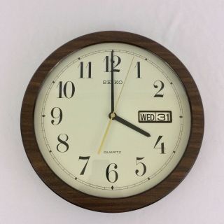 Vintage Seiko 31 Day Calendar Wall Clock Glass Faux Wood 70s Date Time 12 Inches