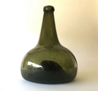 The Best - 18th Century Dutch Onion Black Glass Wine Bottle,  Circa 1730