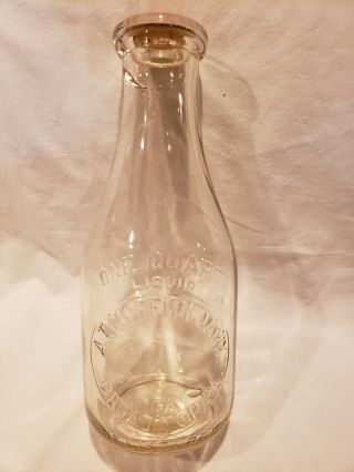 Pennsylvania Embossed Quart Milk Bottle,  A.  T.  Griffith Dairy,  Broad Top,  Pa