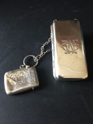 A Plain Silver Rectangular Cigarette Case On Chain.