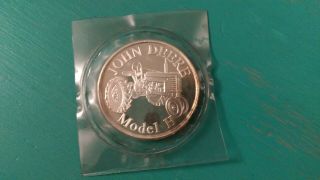 1 Troy Ounce Oz.  John Deere Model H Tractor.  999 Fine Silver Round Coin